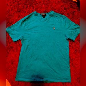Polo Tshirt by Ralph Lauren is in great condition & ready to wear teen XL.